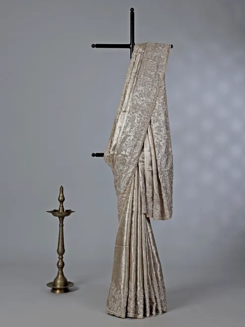 Gold tissue silk saree with zardosi work