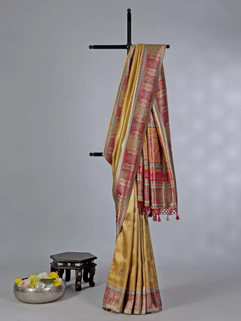 Golden dola tissue silk saree with zari embellishments