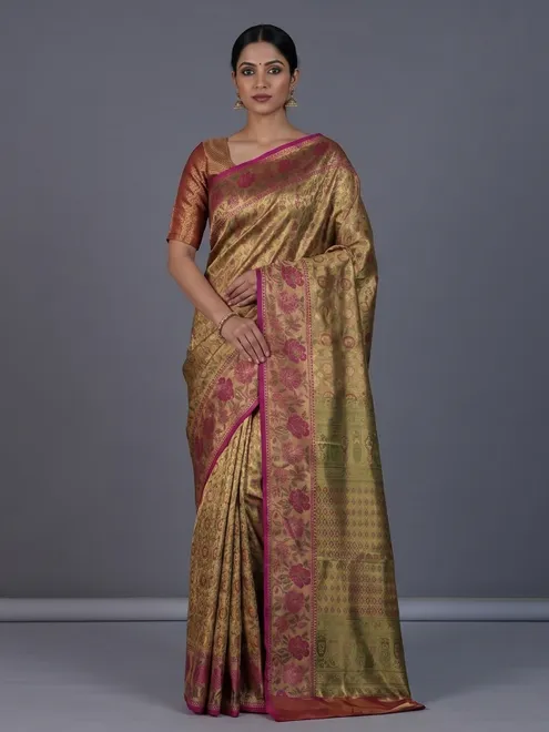 Golden Kanjivaram silk saree with floral motifs