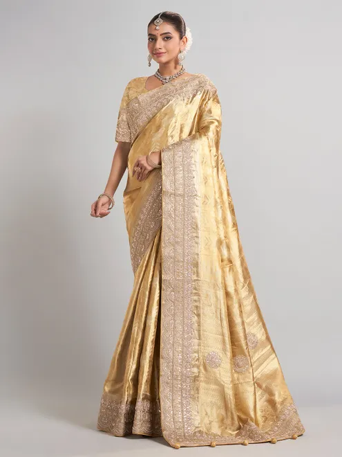 Golden tissue kanjivaram silk saree with luxurious zari work