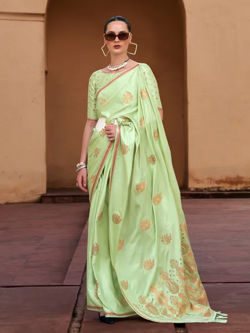 Graceful green satin silk celebration saree