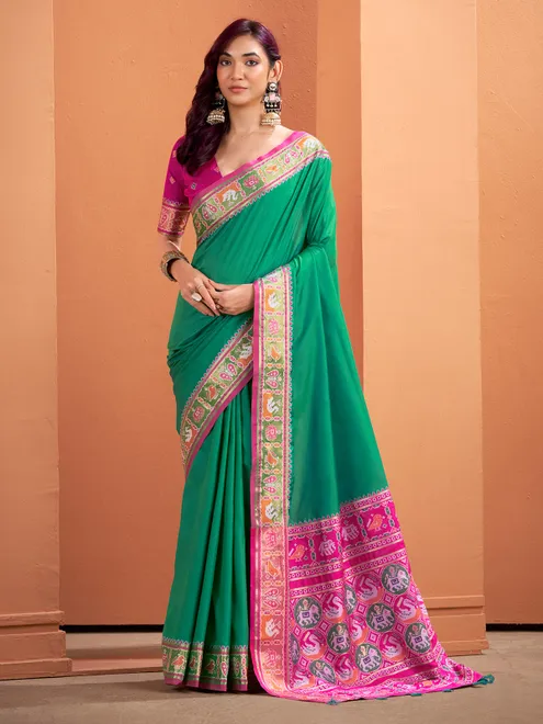 Green patola silk saree with festive radiance