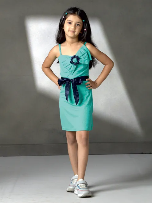 Green silk mini dress with bow charm