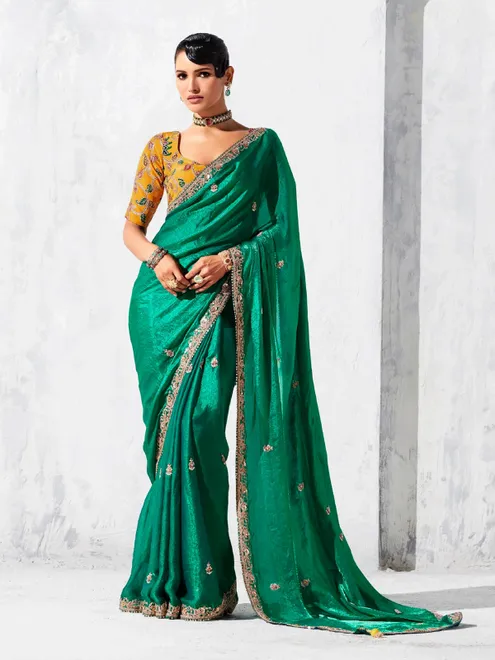 Green tissue silk saree embellished for festival wear