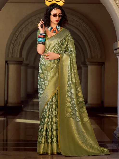 Green tissue silk saree with zari work
