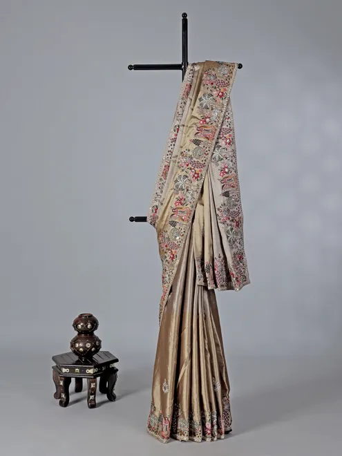 Grey and gold embellished tissue silk saree