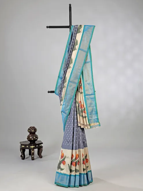 Grey zari weaving patola silk saree for royal occasions