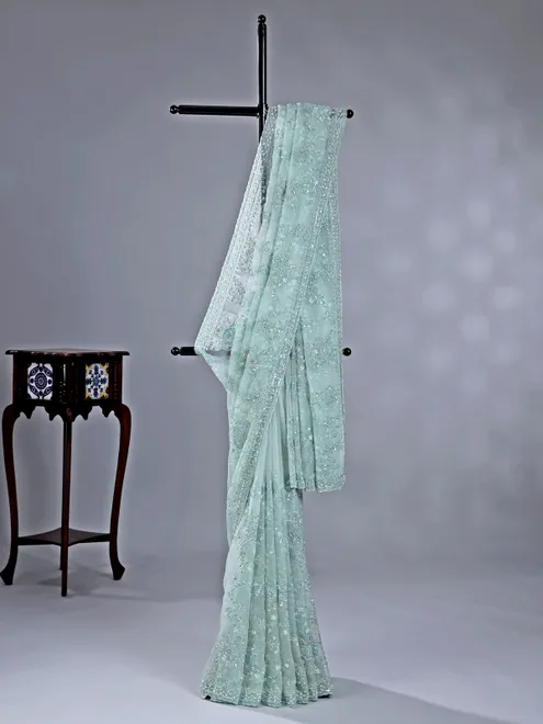 Light green organza saree with beaded detailing