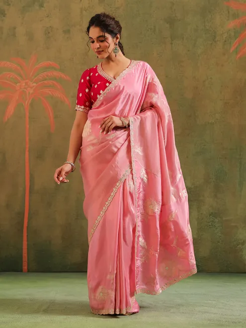 Light pink silk saree with red accents wedding wear
