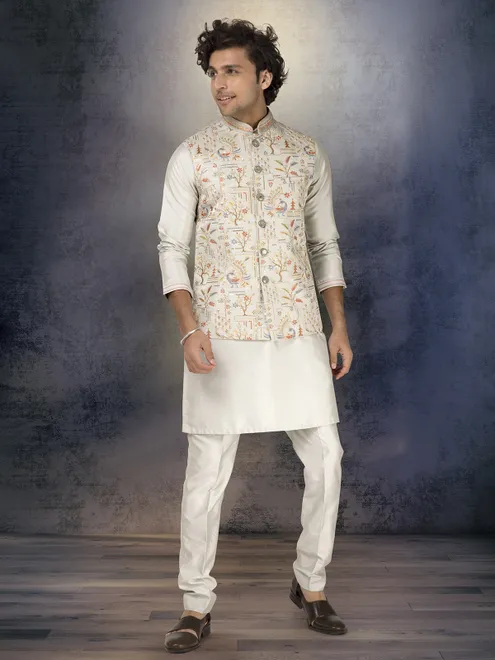 Light pista green silk waistcoat set with thread and sequins work