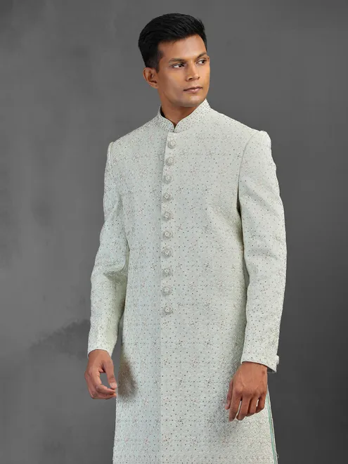 Light pista silk sherwani with thread and stone detailing