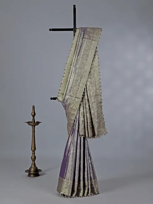 Light purple kanjivaram silk saree with pearl highlights