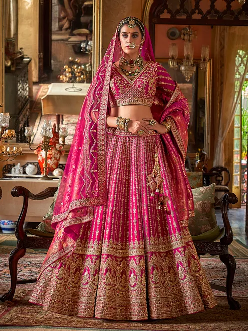 Magenta bridal silk lehenga choli with two dupatta