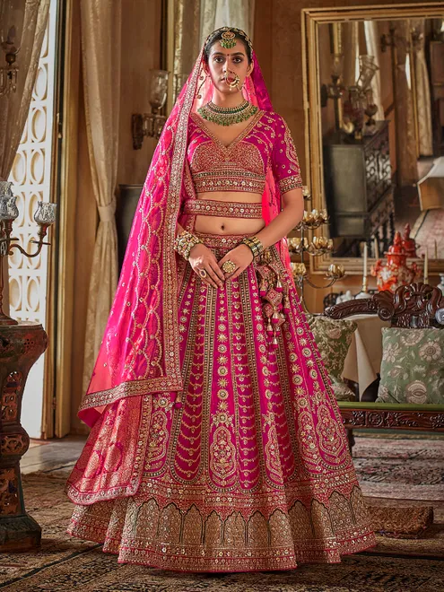 Magenta silk bridal lehenga choli with rich sequins embellishment