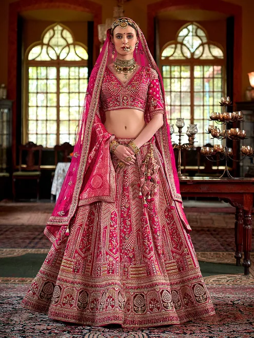 Magenta silk bridal lehenga choli with sequins work