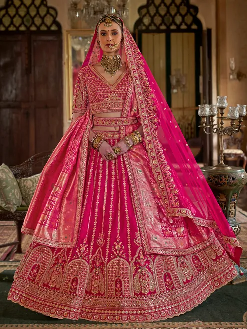Magenta silk bridal lehenga choli with rich sewuins work