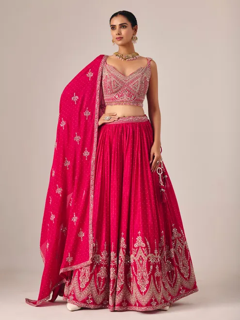 Magenta silk lehenga choli with mirror and embroidered artistry