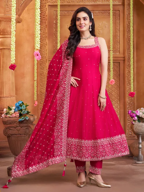 Magenta silk salwar suit with shimmering festive details
