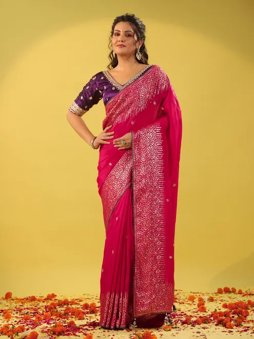 Magenta silk saree with purple blouse for wedding