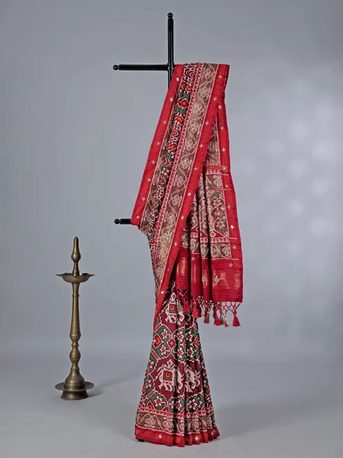 Maroon patola silk saree with zardosi highlights
