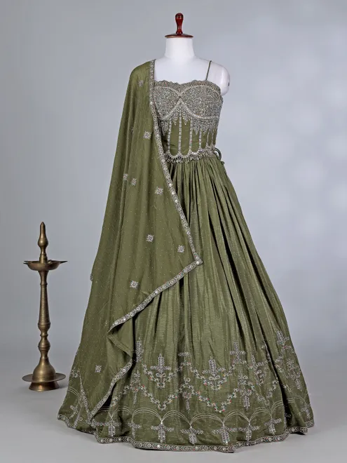 Mehendi green silk lehenga choli with cutdana glow