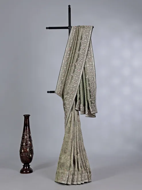 Mehendi green tissue silk saree with stone and sequin detailing