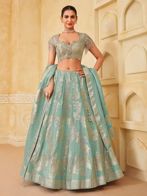 Mint blue silk lehenga choli with zari glow