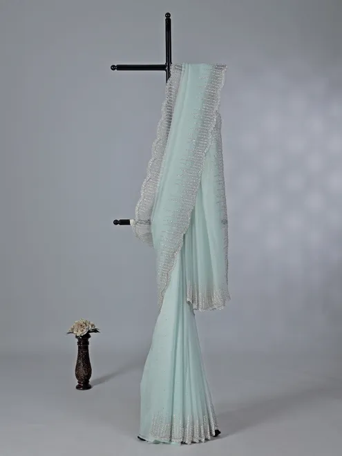 Mint blue tissue silk saree with sequins highlights