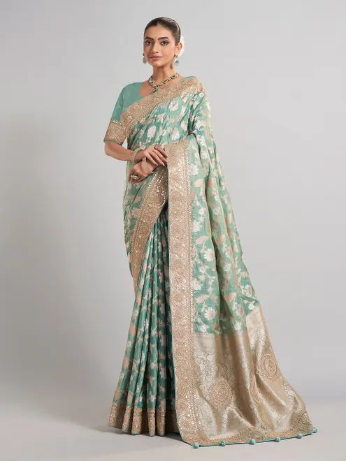 Mint green banarasi silk saree with zari weaving for weddings