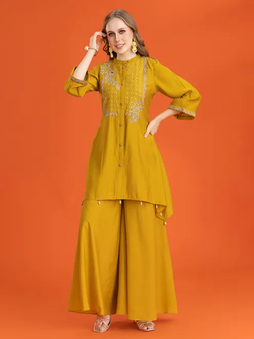 Mustard yellow kurti set with traditional accents