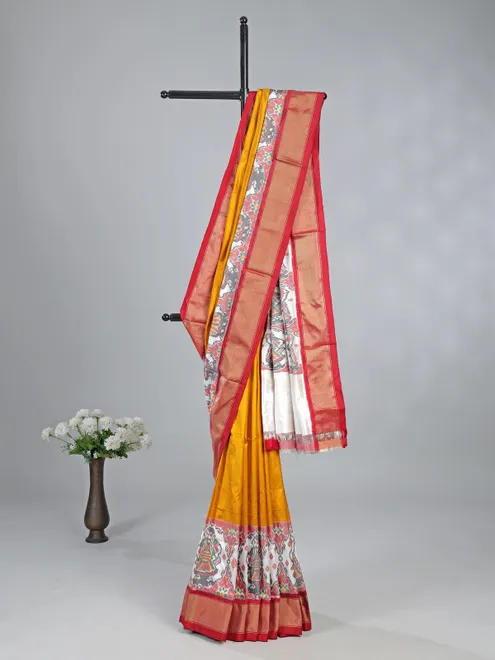 Mustard yellow patola silk saree for wedding wear