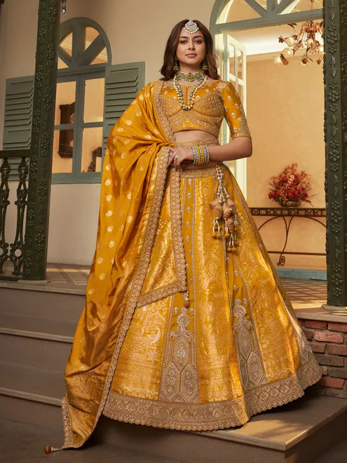 Mustard yellow radiant zari swarovski unstitched lehenga choli