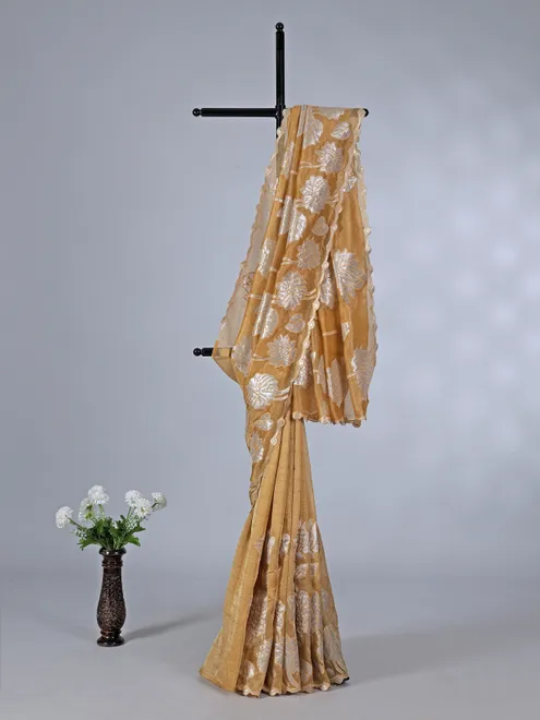 Mustard yellow semi tissue silk saree with zari highlights