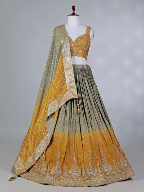 Mustard yellow silk lehenga choli with aabla work