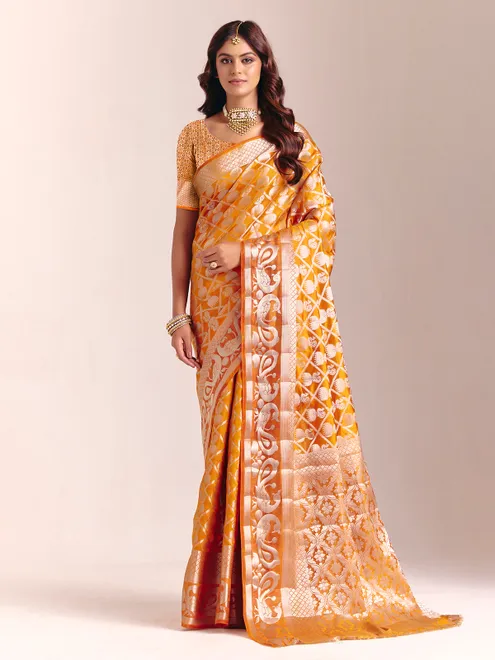 Mustard yellow silk saree with rich zari craftsmanship