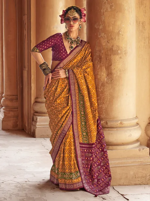 Mustard yellow vibrant patola saree