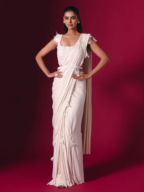Off white lycra saree with elegant heavy embellishments