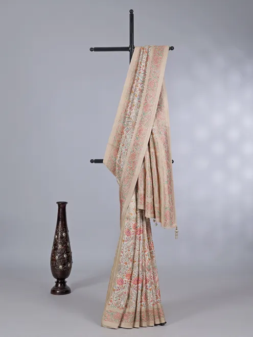 Off white pashmina silk saree with colorful motifs