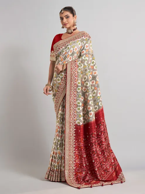 Off-white patola silk saree for wedding elegance