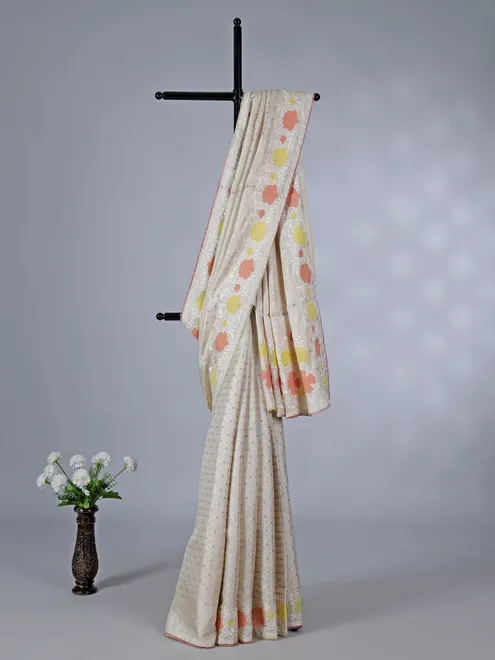 Off white peach semi silk saree with zari and embroidery accents
