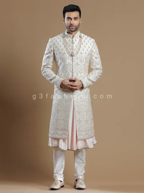 Off white rich raw silk groom wear sherwani