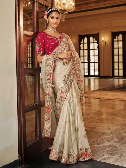 Off white silk festive wear saree with red blouse