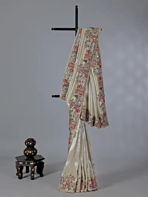 Off white tissue silk embroidery saree for wedding
