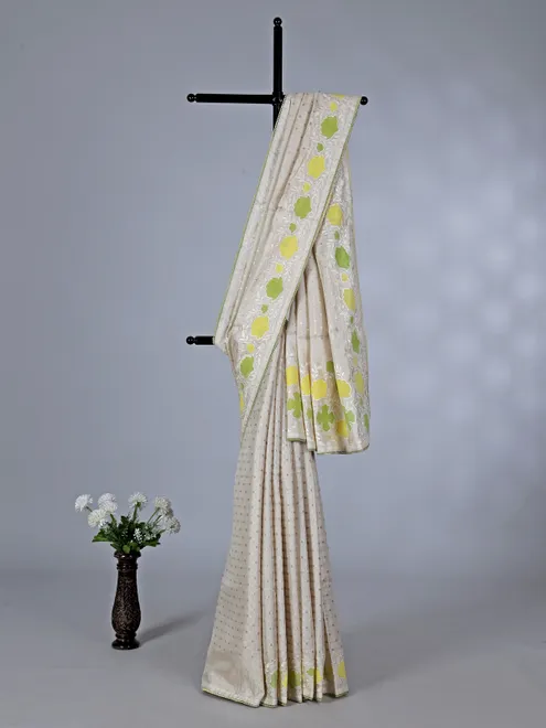 Off white yellow semi silk saree with zari design