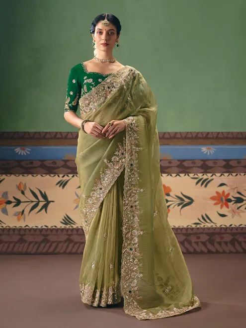 Olive green fancy silk saree accented with resham work