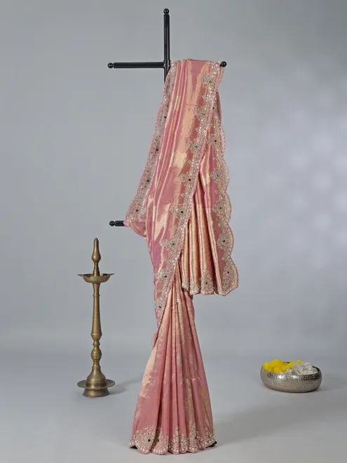 Onion pink tissue silk saree with zari accents