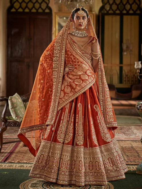 Orange bridal silk lehenga choli with embroidery