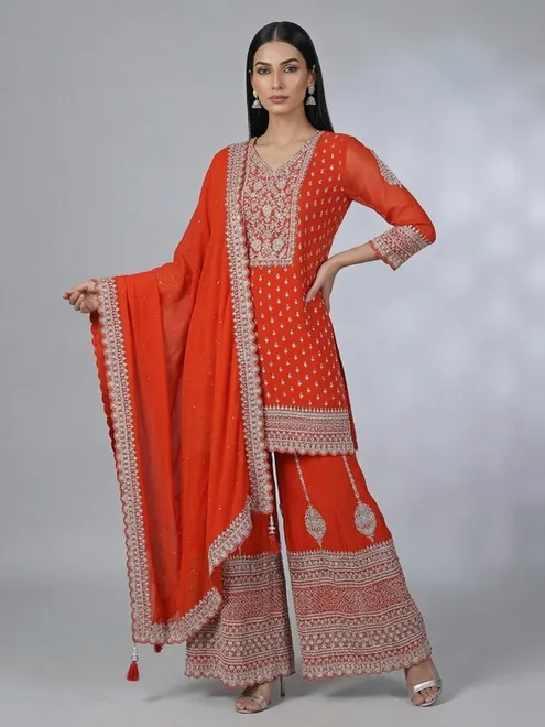 Orange georgette pakistani style embellished palazzo suit