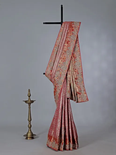 Orange semi kanjivaram silk saree with zardosi work