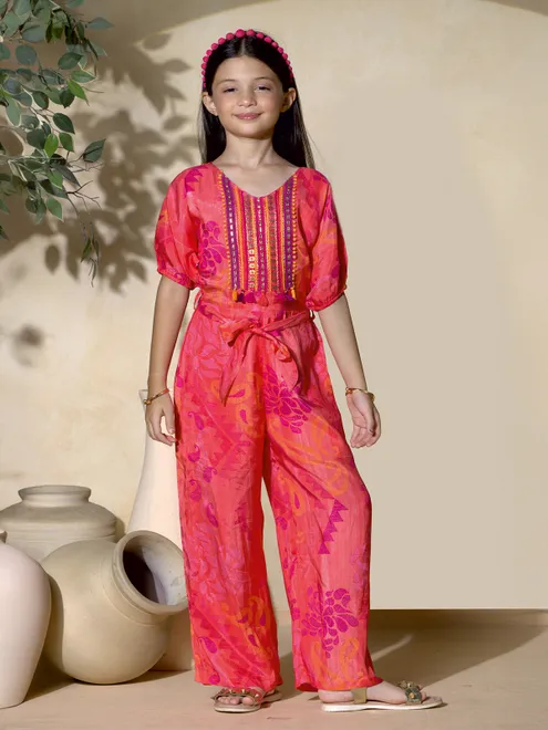 Orange silk belted jumpsuit for girls party wear